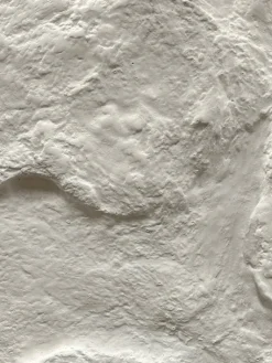 Efektiseinä Basebeton Rockwall tasoitetun seinän päälle, asennettuna, eri värejä